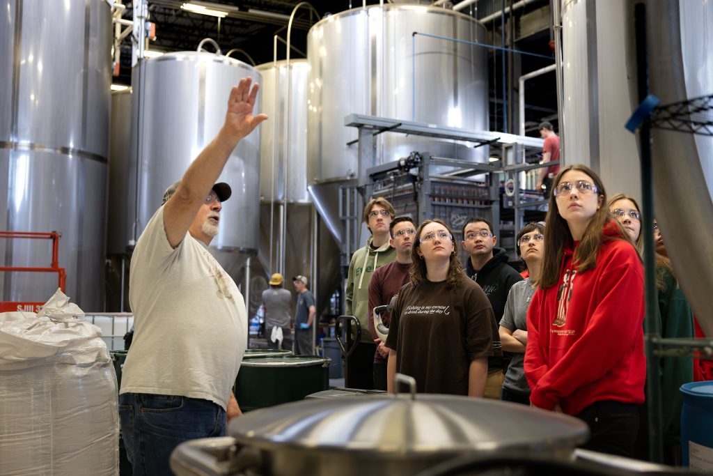 Students tour a brewery