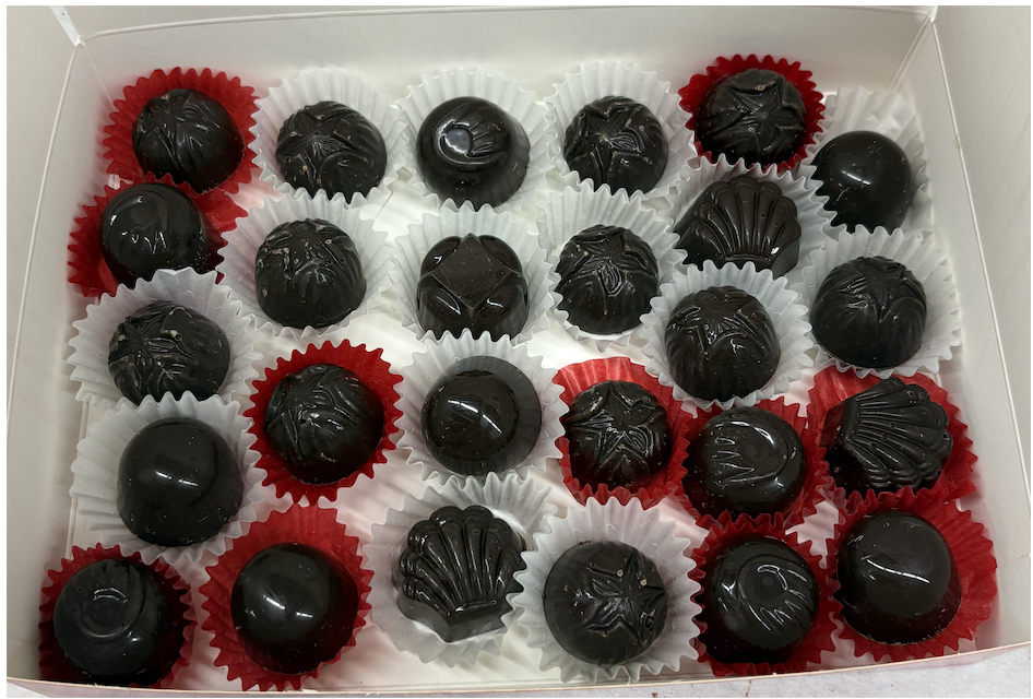 dark chocolate truffles in cupcake wrappers 